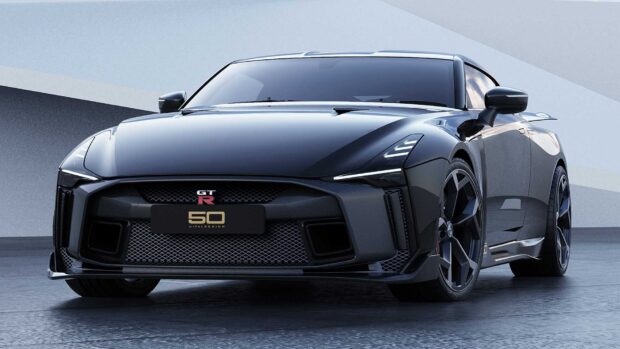 A black Nissan GT R with aerodynamic design is parked on a textured surface, HD Desktop Wallpaper