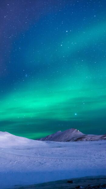 The glacier landscape is illuminated by stunning northern lights in the night sky, 4K Phone Wallpaper