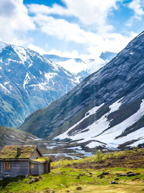 A peaceful mountain landscape in Norway with snow and a wooden cabin, HD Mobile Wallpaper