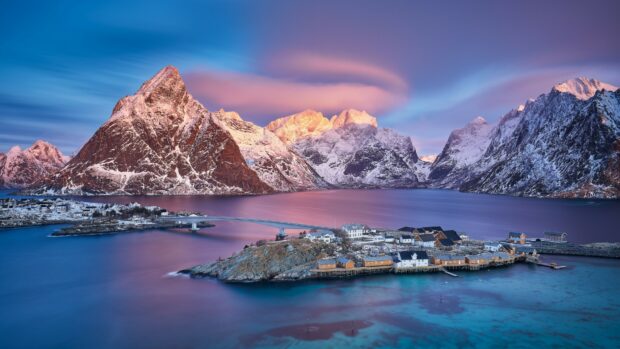 A breathtaking view of Norway mountains covered in snow during sunset, 4K Desktop Wallpaper