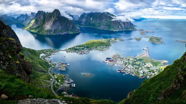 A panoramic view of the Norwegian fjords with mountains and water, HD Desktop Wallpaper