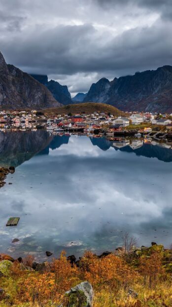 A peaceful view of Norwegian fjords reflecting on calm water with autumn colors, HD Mobile Wallpaper
