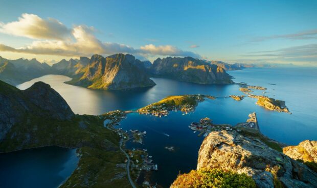 The Norwegian fjords are surrounded by steep mountains and calm blue water, HD Desktop Wallpaper