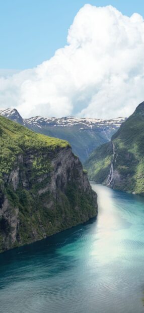 A scenic view of Norwegian fjords with blue water and green cliffs, HD Phone Wallpaper