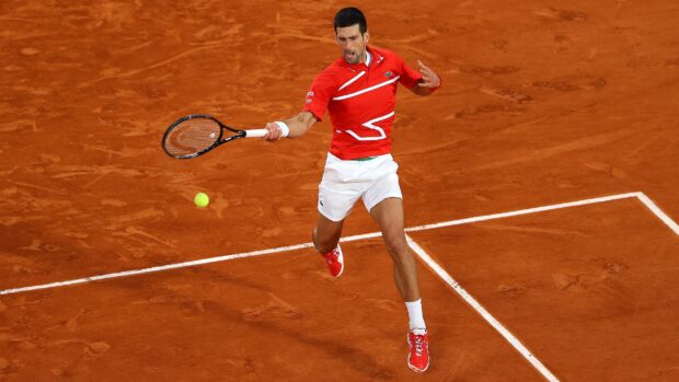 Novak Djokovic hits a forehand on the clay court at the French Open Roland Garros, 2K Desktop Wallpaper