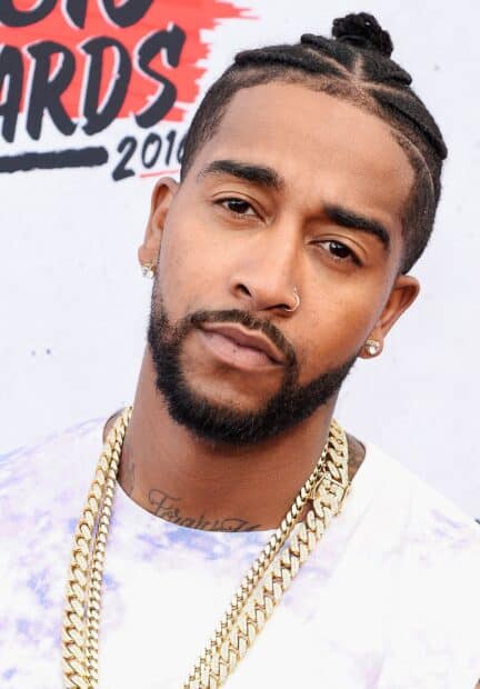 Omarion wallpapers features a close up of a man with braided hair and gold chains, HD Mobile Wallpaper