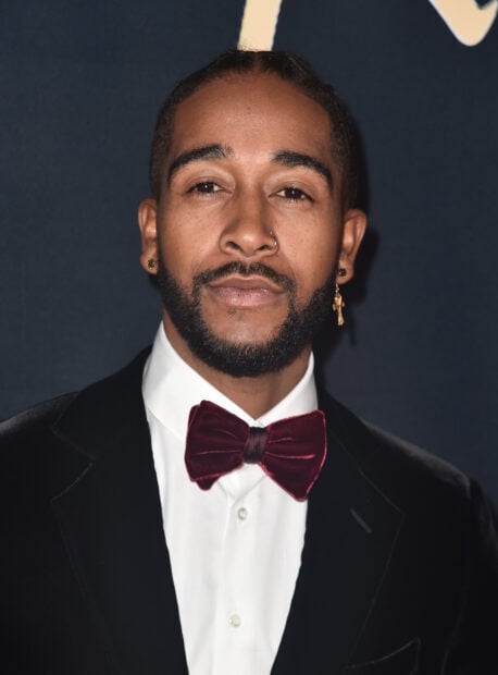 Omarion wears a white shirt with a maroon bow tie and black suit in this portrait, HD Mobile Wallpaper