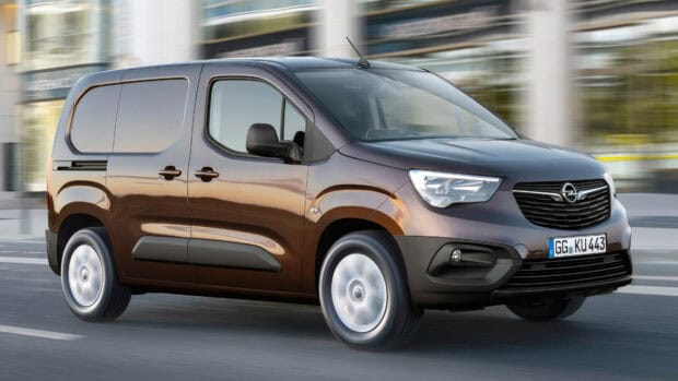 A brown Opel Combo driving through an urban area during sunset, 4K Desktop Wallpaper