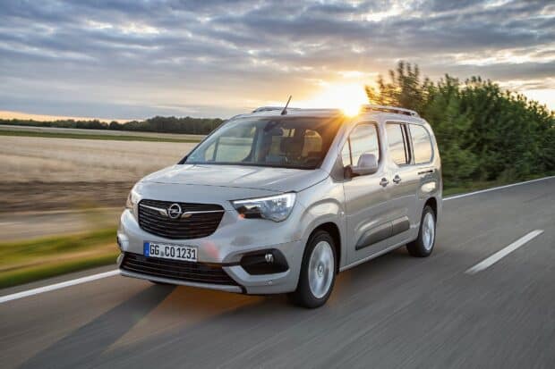 A silver Opel Combo drives on a country road during sunset with clear skies, HD Desktop Wallpaper