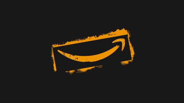The Amazon logo in vibrant orange with a grunge border on black, 2K Desktop Wallpaper