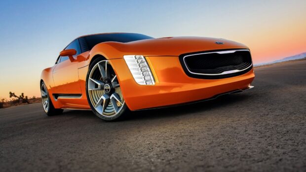 An orange Kia Stinger is parked on an open desert road during sunset time, HD Desktop Wallpaper