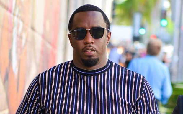 P Diddy Sean Combs wears sunglasses and a striped shirt walking outdoors, HD Desktop Wallpaper