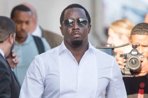 P Diddy Sean Combs wears sunglasses and a white shirt while walking in public, HD Desktop Wallpaper