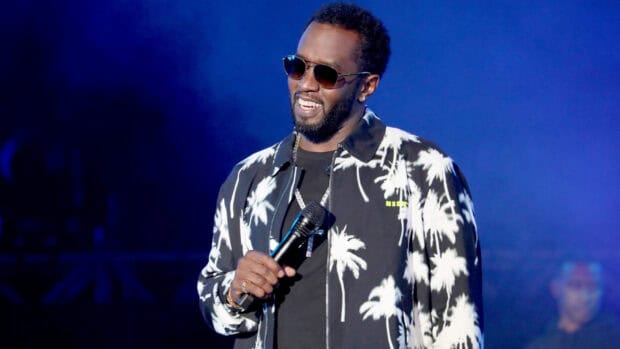 P Diddy Sean Combs is singing with a microphone in his hand during a live concert, HD Desktop Wallpaper
