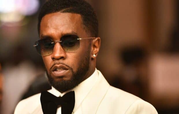 P Diddy Sean Combs wears sunglasses and a tuxedo at a formal event, HD Desktop Wallpaper