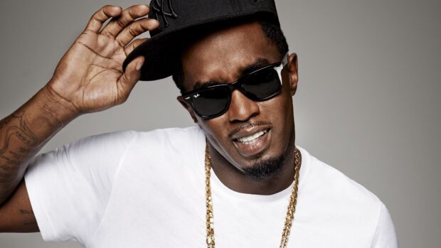 A close up of P Diddy Sean Combs wearing sunglasses and a gold chain, HD Desktop Wallpaper