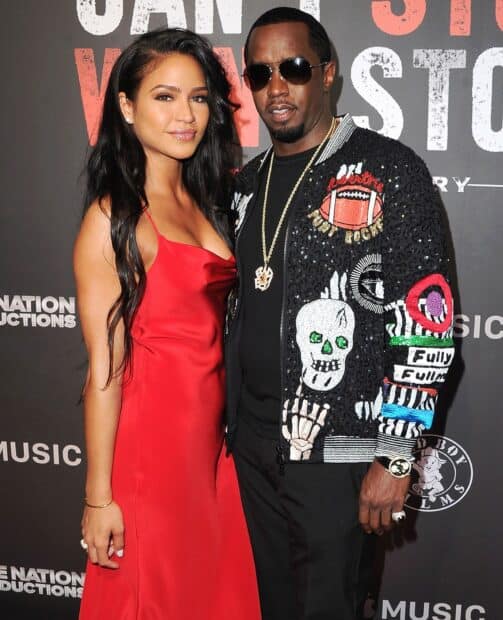 P Diddy Sean Combs stands next to a woman wearing a red dress at a music event, HD Mobile Wallpaper