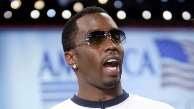 P Diddy Sean Combs is wearing sunglasses while speaking at an event, HD Desktop Wallpaper