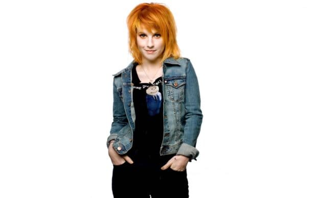 A portrait of Paramore with orange hair and denim jacket against a white background, HD Desktop Wallpaper