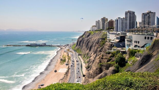 A scenic view of the coastal city with cliffs and ocean waves in Peru Wallpapers, HD Desktop Wallpaper