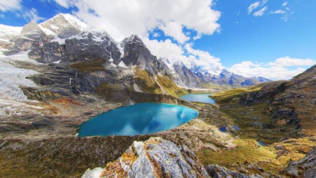 A beautiful mountain lake surrounded by peaks is shown in Peru Wallpapers, HD Desktop Wallpaper