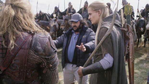 Peter Jackson is directing a scene with actors in medieval costumes and horses, HD Desktop Wallpaper