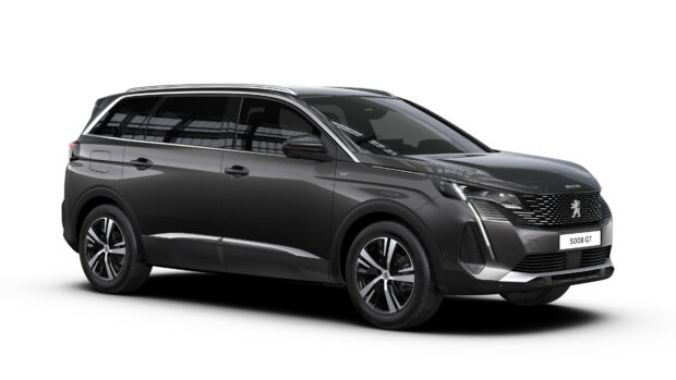 The Peugeot 5008 GT in black is shown from the side with detailed headlights, wheels, and windows, 4K Desktop Wallpaper