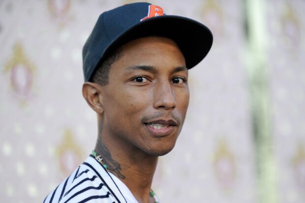 A close up portrait of Pharrell Williams smiling and wearing a cap, HD Desktop Wallpaper