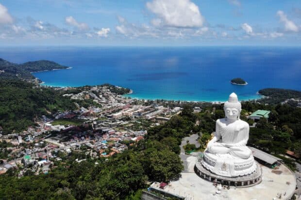 The Phuket Wallpapers show a large white Buddha overlooking the coastline and town, 2K Desktop Wallpaper