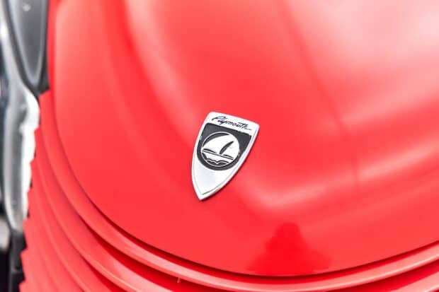 The Plymouth Prowler emblem is displayed on the bright red car hood, HD Desktop Wallpaper