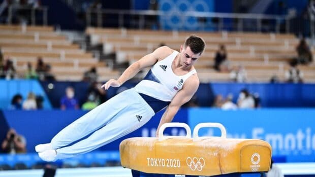 A male gymnast performs a pommel horse routine at Tokyo 2020 Olympics, HD Desktop Wallpaper