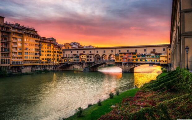 The view of Ponte Vecchio bridge over the river with colorful buildings at sunset, HD Desktop Wallpaper