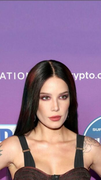 This is a portrait of Halsey with dark makeup and tattoos visible on her arms, HD Phone Wallpaper
