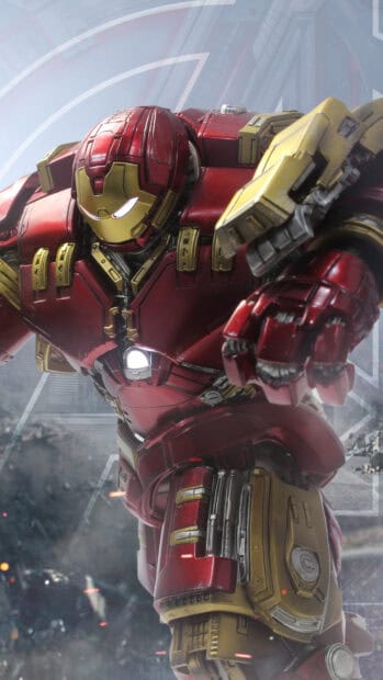 A detailed Hulkbuster armor is ready to fight in a city battle scene, 4K Phone Wallpaper