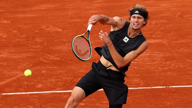 A tennis player intensely hitting the ball during the French Open Roland Garros match, 2K Desktop Wallpaper
