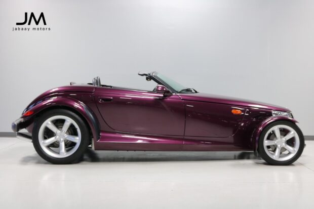 A purple Plymouth Prowler is shown from the side with a sleek convertible design, HD Desktop Wallpaper