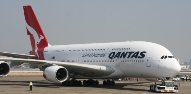 A Qantas Airbus A380 is parked on the runway at the airport, 2K Desktop Wallpaper