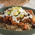 A bowl of quinoa with roasted sweet potatoes, black beans, avocado, and drizzle of sauce, HD Desktop Wallpaper