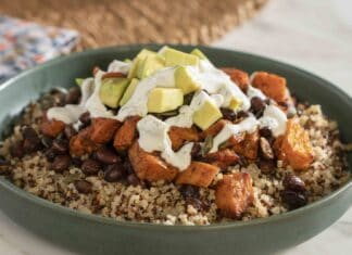 A bowl of quinoa with roasted sweet potatoes, black beans, avocado, and drizzle of sauce, HD Desktop Wallpaper