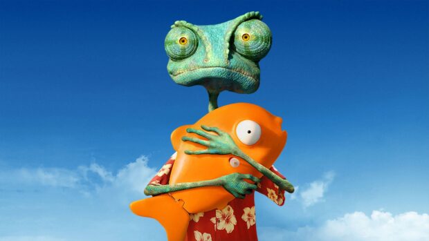 A quirky chameleon hugs an orange fish with a clear blue sky background featuring Gore Verbinski wallpapers, 4K Desktop Wallpaper