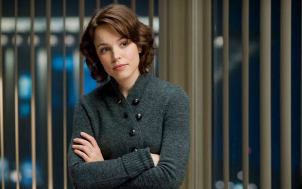 Rachel Mcadams is standing with arms crossed wearing a dark sweater near window blinds, HD Desktop Wallpaper