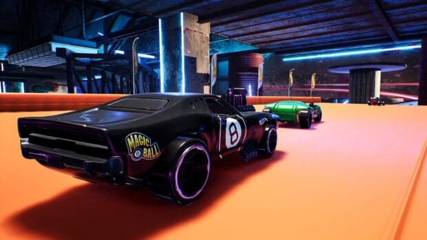 A black Hot Wheels car races on a neon lit track with other colorful cars, HD Desktop Wallpaper