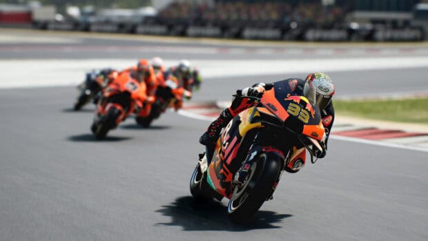 A motorcycle racer leads a group of riders on a race track in a racing game, HD Desktop Wallpaper