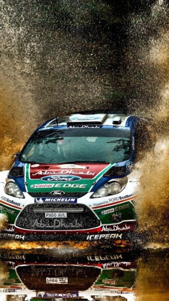 A Ford rally raid car is speeding through muddy water creating a large splash, HD Mobile Wallpaper