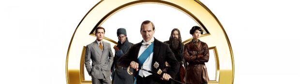 Ralph Fiennes stands with a group in period clothing from a historical drama, 4K Desktop Wallpaper