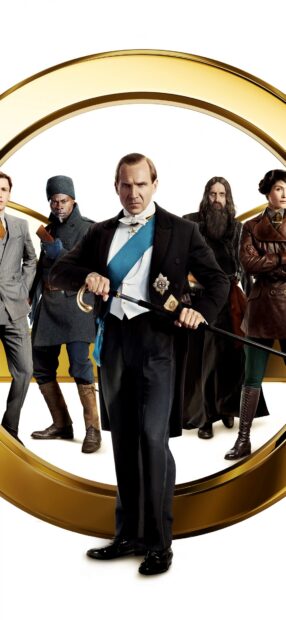 Ralph Fiennes stands confidently in a formal suit with a cane, HD Mobile Wallpaper