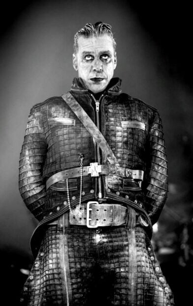 A close up of a Rammstein band member in elaborate costume during a live concert, HD Mobile Wallpaper
