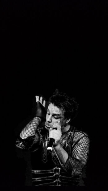 The image shows Rammstein performing with intense emotion and unique stage style, HD Phone Wallpaper