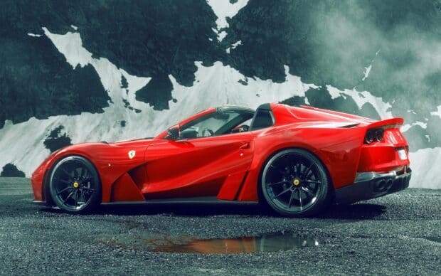 A red Ferrari 812 Gts is parked on a mountainous road with rocky terrain in the background, HD Desktop Wallpaper