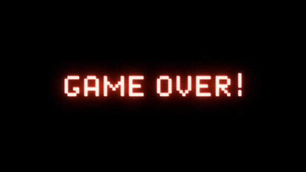Red glowing game over text appears on a black screen in pixel style, HD Desktop Wallpaper